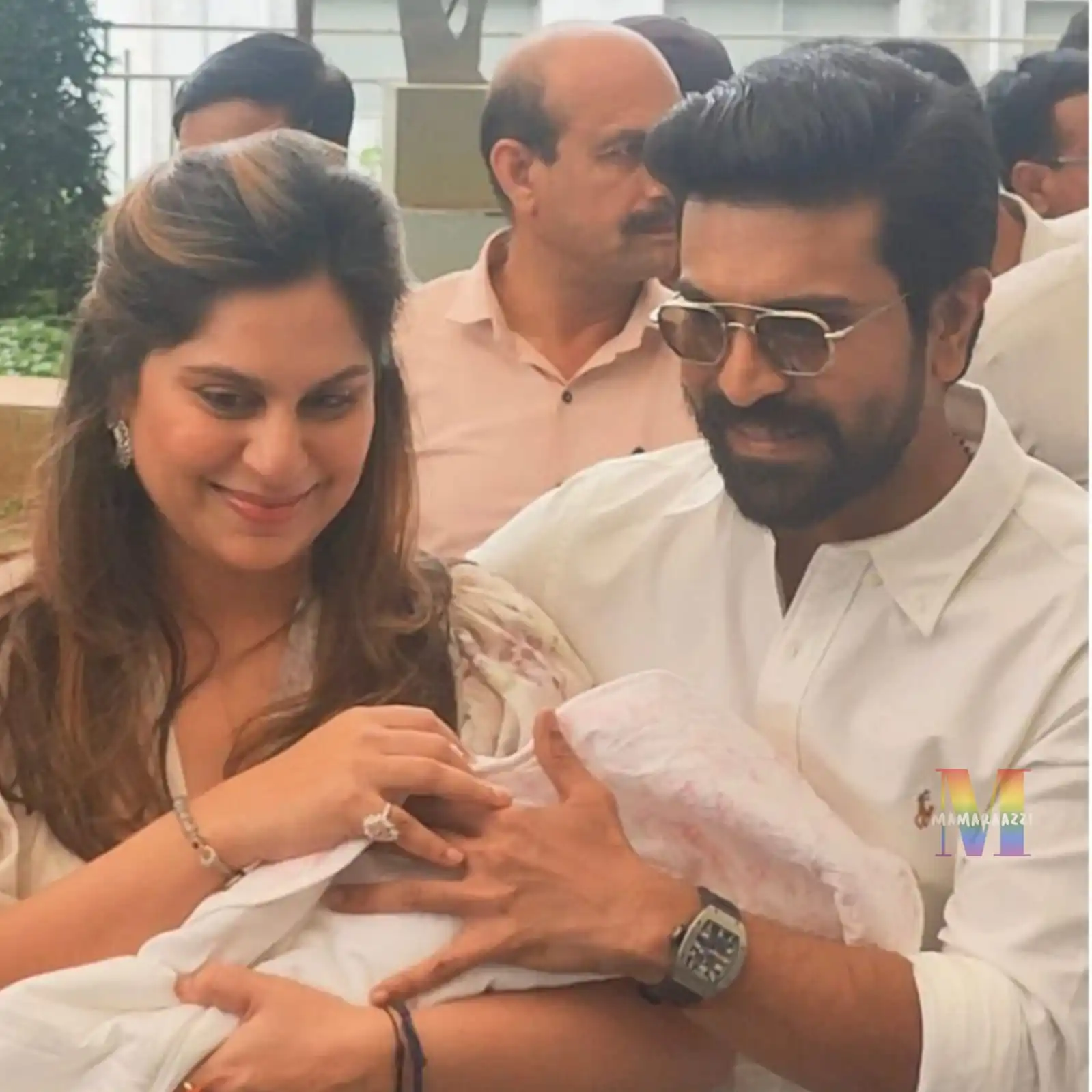 Ram Charan, Upasana Konidela showered with rose petals as they pose with baby for first time